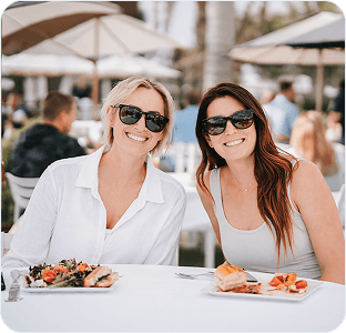 Surge Collective members at an event table